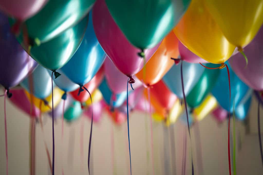 colorful latex helium balloons floating