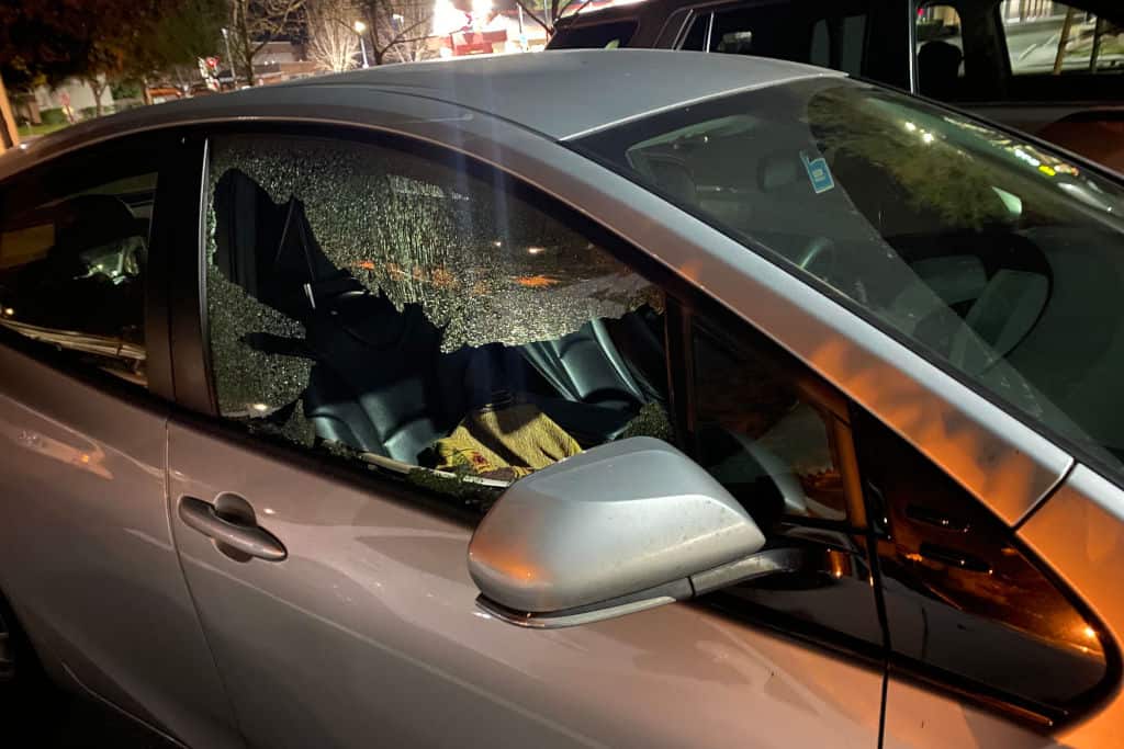 broken front car window at night