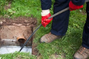 worker Trenchless sewer repair