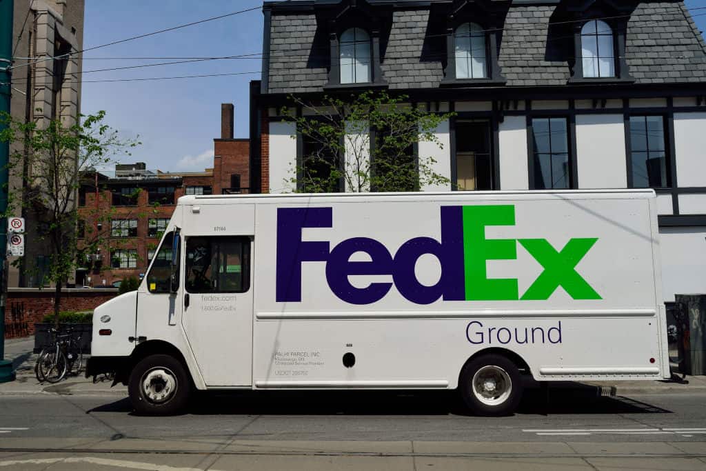 FedEx ground truck on the street