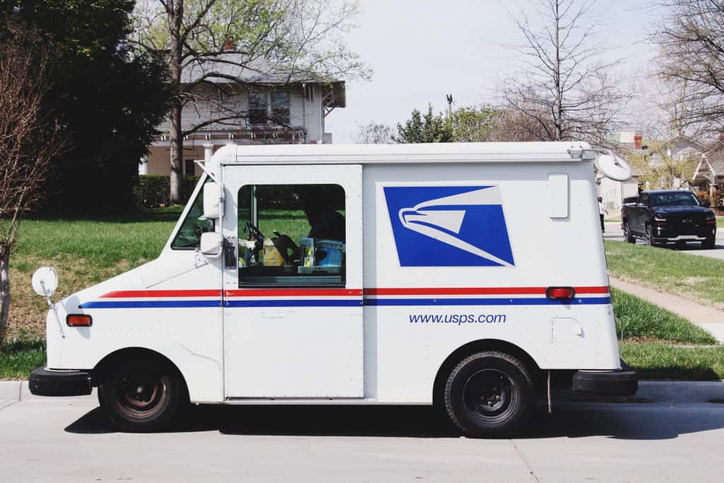 US postal office (USPS) delivery truck mail carrier